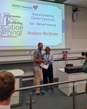 Andrew receiving his award